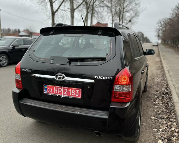 Черный Хендай Туксон, объемом двигателя 2 л и пробегом 136 тыс. км за 8500 $, фото 10 на Automoto.ua