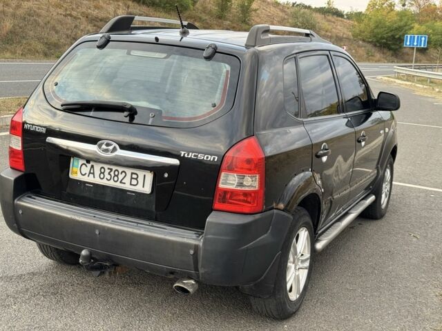 Чорний Хендай Туксон, об'ємом двигуна 2 л та пробігом 291 тис. км за 5400 $, фото 3 на Automoto.ua