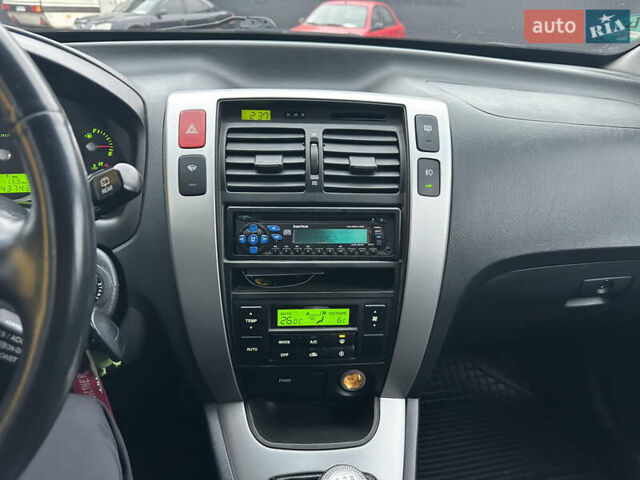 Чорний Хендай Туксон, об'ємом двигуна 2 л та пробігом 243 тис. км за 7999 $, фото 34 на Automoto.ua