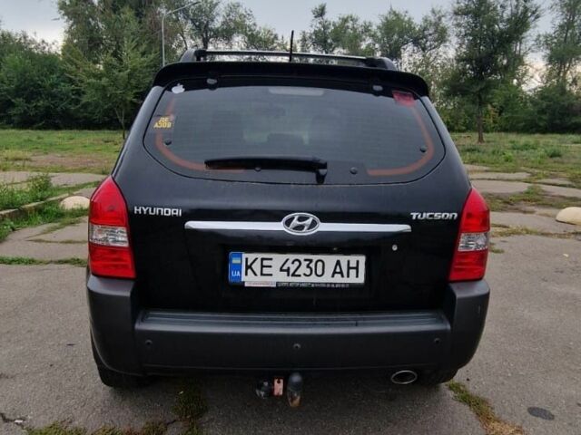 Черный Хендай Туксон, объемом двигателя 2 л и пробегом 193 тыс. км за 8100 $, фото 5 на Automoto.ua