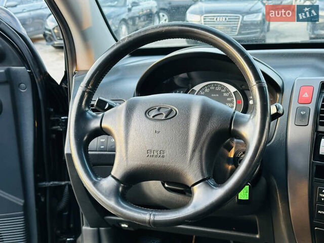 Чорний Хендай Туксон, об'ємом двигуна 2 л та пробігом 186 тис. км за 8300 $, фото 19 на Automoto.ua