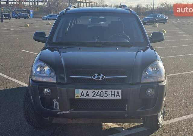 Чорний Хендай Туксон, об'ємом двигуна 1.98 л та пробігом 212 тис. км за 7766 $, фото 8 на Automoto.ua
