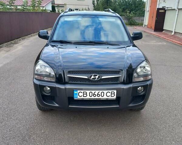 Черный Хендай Туксон, объемом двигателя 2 л и пробегом 168 тыс. км за 9000 $, фото 3 на Automoto.ua