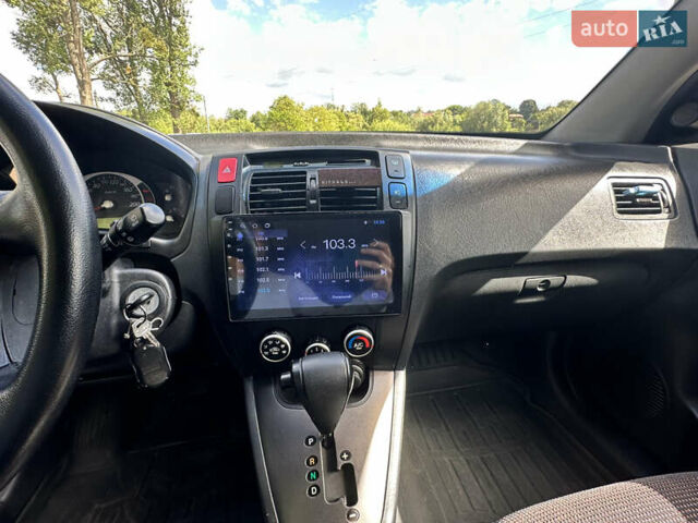 Чорний Хендай Туксон, об'ємом двигуна 1.98 л та пробігом 279 тис. км за 8200 $, фото 17 на Automoto.ua