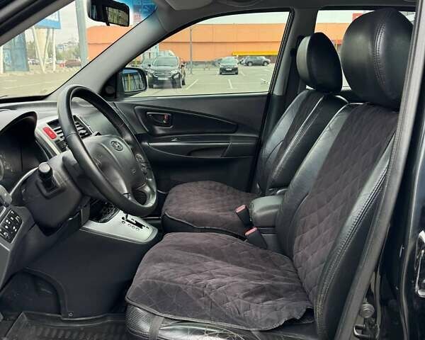 Черный Хендай Туксон, объемом двигателя 1.98 л и пробегом 202 тыс. км за 8350 $, фото 17 на Automoto.ua