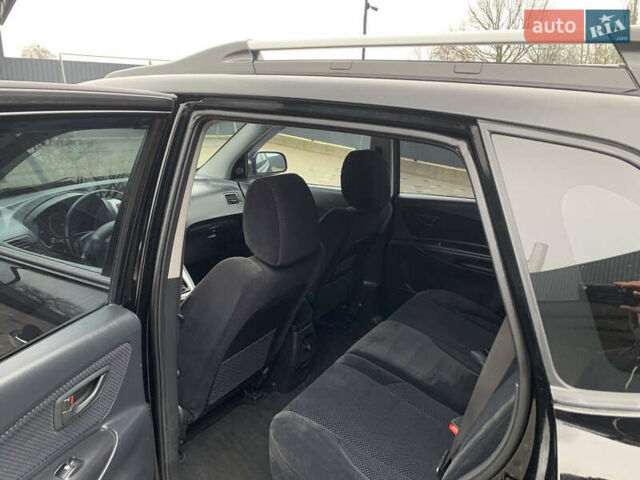 Черный Хендай Туксон, объемом двигателя 2 л и пробегом 198 тыс. км за 7500 $, фото 7 на Automoto.ua