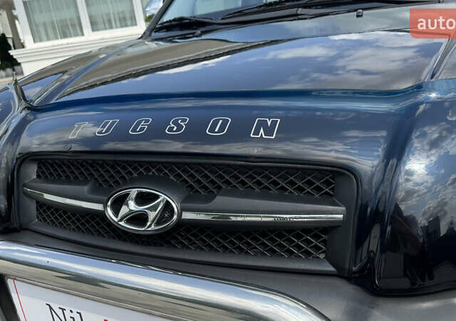 Черный Хендай Туксон, объемом двигателя 2 л и пробегом 67 тыс. км за 9999 $, фото 3 на Automoto.ua