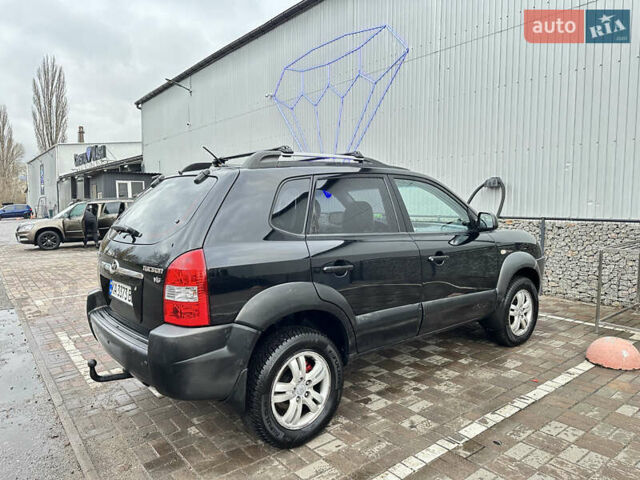 Чорний Хендай Туксон, об'ємом двигуна 2.66 л та пробігом 395 тис. км за 9950 $, фото 8 на Automoto.ua