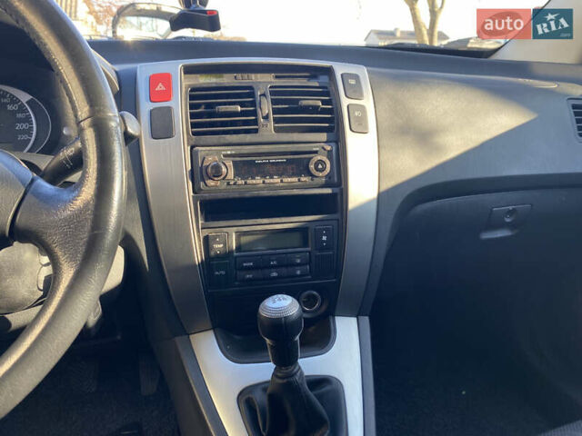 Черный Хендай Туксон, объемом двигателя 2 л и пробегом 149 тыс. км за 8250 $, фото 9 на Automoto.ua