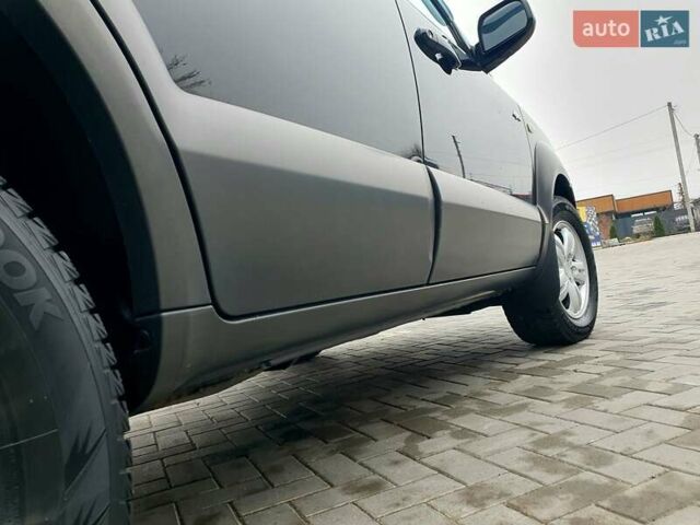 Чорний Хендай Туксон, об'ємом двигуна 2 л та пробігом 225 тис. км за 8000 $, фото 22 на Automoto.ua