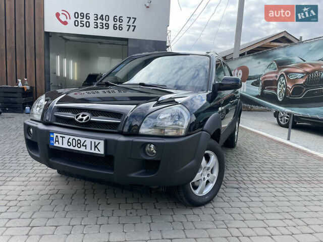 Черный Хендай Туксон, объемом двигателя 1.98 л и пробегом 177 тыс. км за 7600 $, фото 1 на Automoto.ua