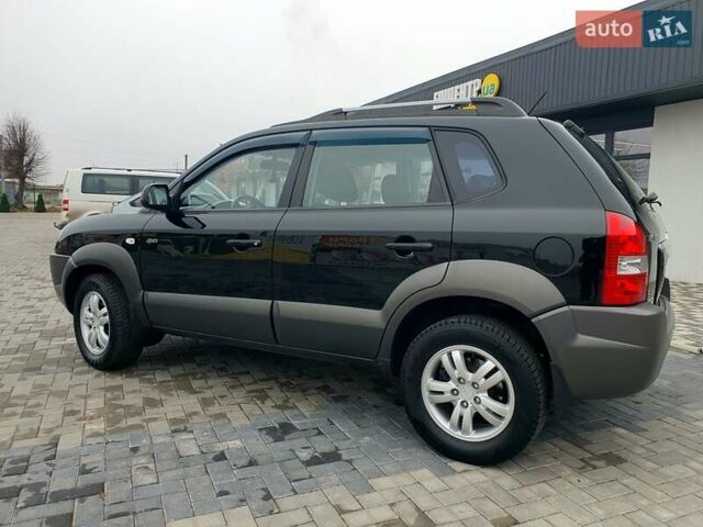 Чорний Хендай Туксон, об'ємом двигуна 2 л та пробігом 225 тис. км за 8000 $, фото 18 на Automoto.ua