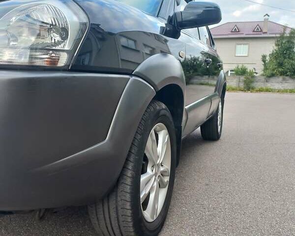 Черный Хендай Туксон, объемом двигателя 2 л и пробегом 168 тыс. км за 9000 $, фото 14 на Automoto.ua