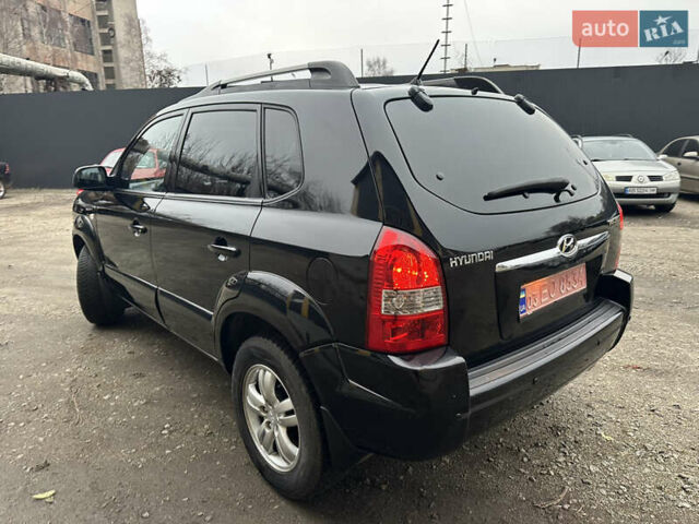 Чорний Хендай Туксон, об'ємом двигуна 2 л та пробігом 243 тис. км за 7999 $, фото 12 на Automoto.ua