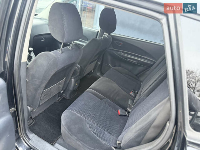 Чорний Хендай Туксон, об'ємом двигуна 2 л та пробігом 240 тис. км за 6888 $, фото 16 на Automoto.ua