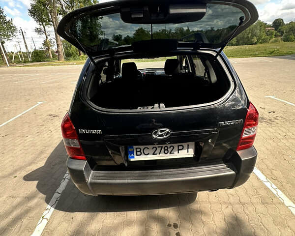 Чорний Хендай Туксон, об'ємом двигуна 1.98 л та пробігом 279 тис. км за 8200 $, фото 14 на Automoto.ua