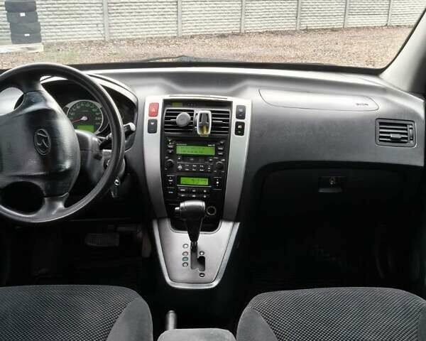 Чорний Хендай Туксон, об'ємом двигуна 2 л та пробігом 185 тис. км за 7499 $, фото 26 на Automoto.ua