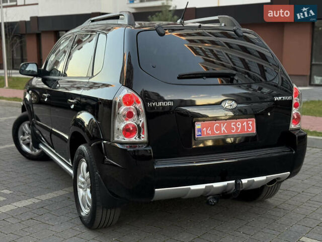 Чорний Хендай Туксон, об'ємом двигуна 2 л та пробігом 156 тис. км за 7850 $, фото 22 на Automoto.ua