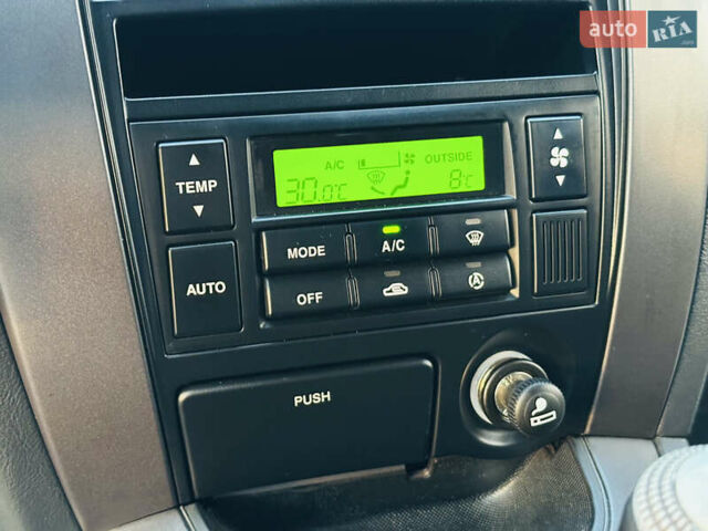 Чорний Хендай Туксон, об'ємом двигуна 2 л та пробігом 186 тис. км за 8300 $, фото 28 на Automoto.ua