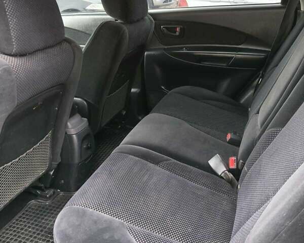 Чорний Хендай Туксон, об'ємом двигуна 2 л та пробігом 185 тис. км за 7499 $, фото 27 на Automoto.ua