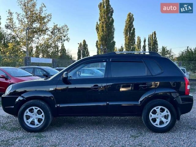 Черный Хендай Туксон, объемом двигателя 2 л и пробегом 230 тыс. км за 7500 $, фото 7 на Automoto.ua