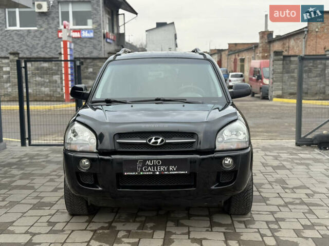 Чорний Хендай Туксон, об'ємом двигуна 2 л та пробігом 240 тис. км за 6888 $, фото 3 на Automoto.ua