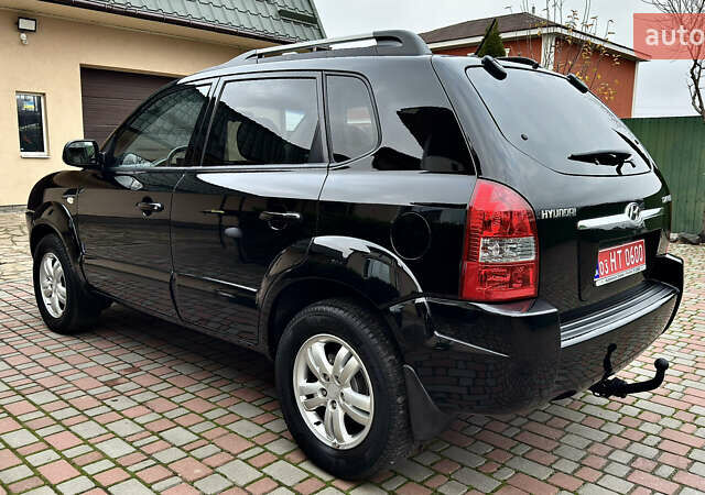 Чорний Хендай Туксон, об'ємом двигуна 2 л та пробігом 182 тис. км за 8299 $, фото 9 на Automoto.ua