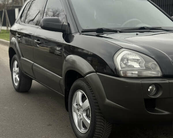Чорний Хендай Туксон, об'ємом двигуна 2 л та пробігом 107 тис. км за 8500 $, фото 7 на Automoto.ua