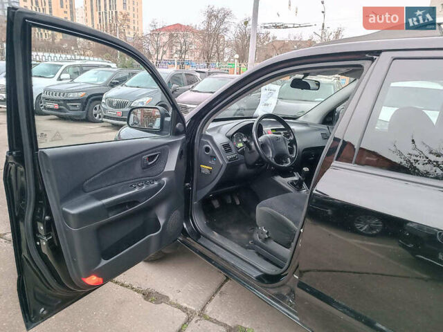 Черный Хендай Туксон, объемом двигателя 2 л и пробегом 192 тыс. км за 7990 $, фото 17 на Automoto.ua