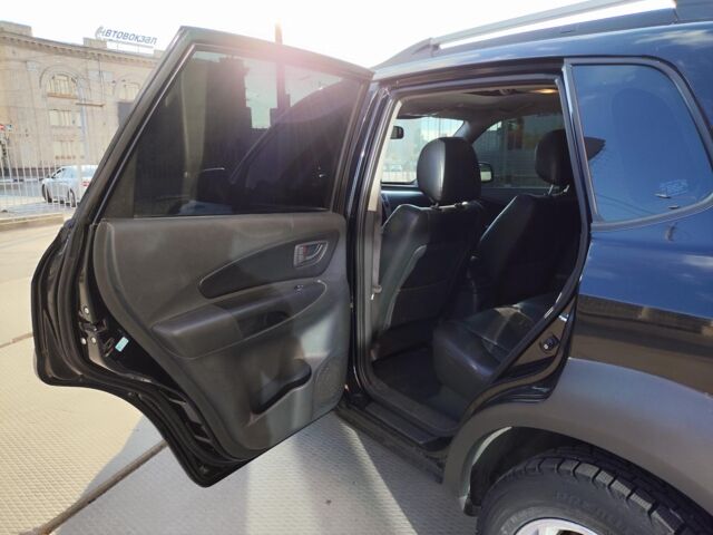 Черный Хендай Туксон, объемом двигателя 2 л и пробегом 82 тыс. км за 7490 $, фото 24 на Automoto.ua