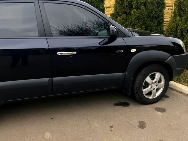 Чорний Хендай Туксон, об'ємом двигуна 2 л та пробігом 333 тис. км за 8450 $, фото 5 на Automoto.ua