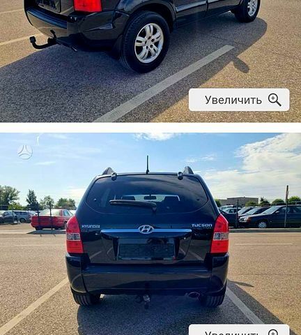 Черный Хендай Туксон, объемом двигателя 2 л и пробегом 175 тыс. км за 8500 $, фото 3 на Automoto.ua