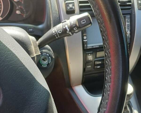 Черный Хендай Туксон, объемом двигателя 1.98 л и пробегом 189 тыс. км за 7800 $, фото 9 на Automoto.ua