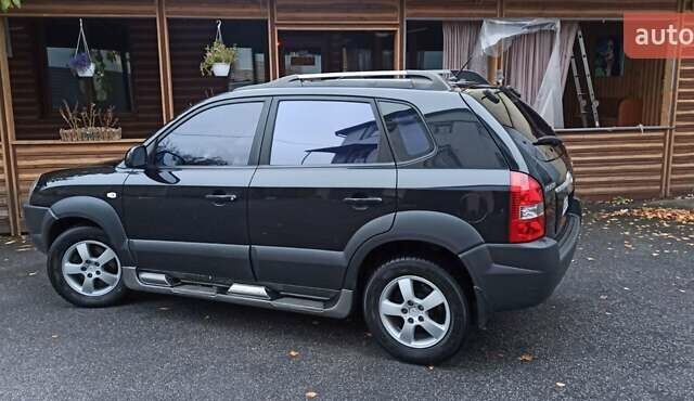Хендай Туксон 2008 у Харкові на Automoto.ua Чорний Хендай Туксон, об'ємом двигуна 1.99 л та пробігом 188 тис. км за 8800 $, фото 14 на Automoto.ua