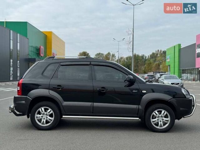 Черный Хендай Туксон, объемом двигателя 1.98 л и пробегом 202 тыс. км за 8350 $, фото 5 на Automoto.ua