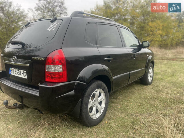 Хендай Туксон 2008 у Лубнах на Automoto.ua Чорний Хендай Туксон, об'ємом двигуна 1.98 л та пробігом 235 тис. км за 6999 $, фото 19 на Automoto.ua