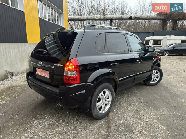 Чорний Хендай Туксон, об'ємом двигуна 2 л та пробігом 243 тис. км за 7999 $, фото 19 на Automoto.ua