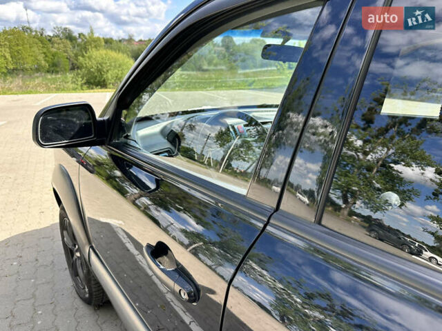 Чорний Хендай Туксон, об'ємом двигуна 1.98 л та пробігом 279 тис. км за 8200 $, фото 7 на Automoto.ua