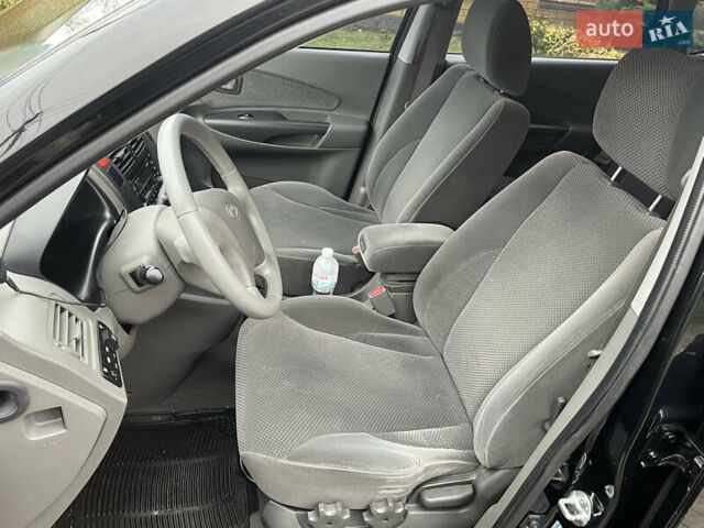 Черный Хендай Туксон, объемом двигателя 2 л и пробегом 107 тыс. км за 8900 $, фото 24 на Automoto.ua