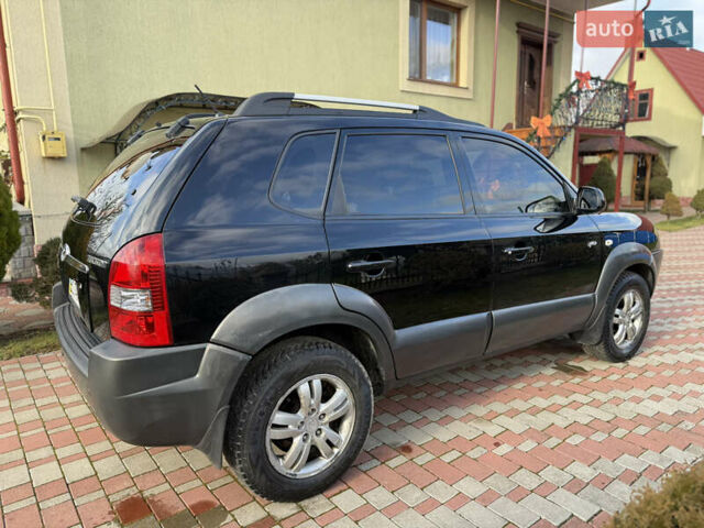 Чорний Хендай Туксон, об'ємом двигуна 2 л та пробігом 314 тис. км за 7000 $, фото 12 на Automoto.ua