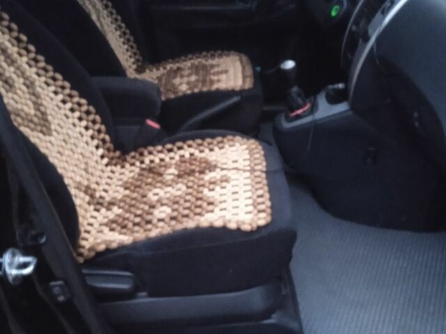 Черный Хендай Туксон, объемом двигателя 2 л и пробегом 209 тыс. км за 8200 $, фото 4 на Automoto.ua