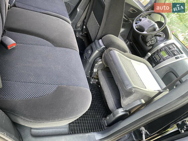 Чорний Хендай Туксон, об'ємом двигуна 2 л та пробігом 160 тис. км за 8800 $, фото 14 на Automoto.ua
