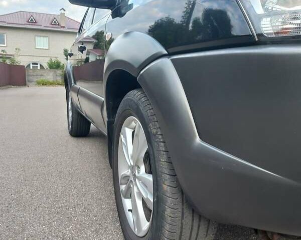 Черный Хендай Туксон, объемом двигателя 2 л и пробегом 168 тыс. км за 9000 $, фото 17 на Automoto.ua