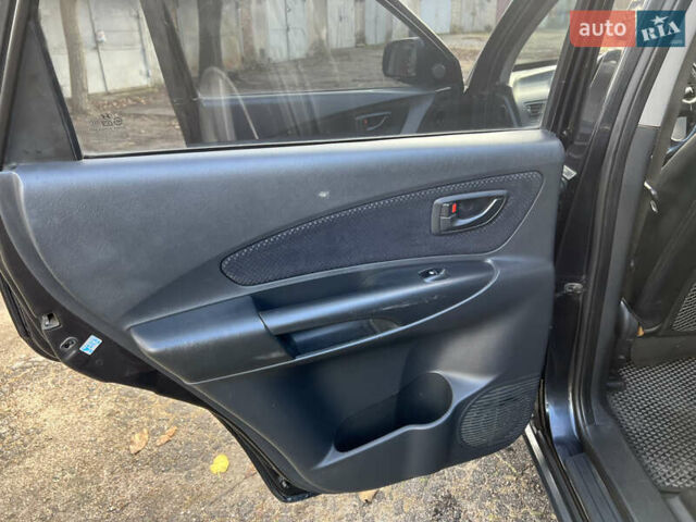 Чорний Хендай Туксон, об'ємом двигуна 2 л та пробігом 240 тис. км за 8500 $, фото 13 на Automoto.ua