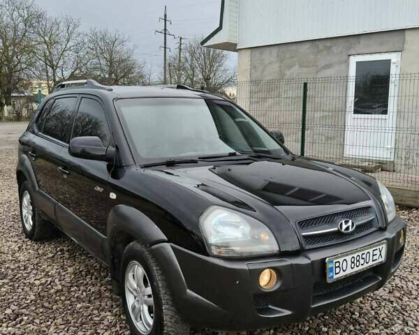 Чорний Хендай Туксон, об'ємом двигуна 2 л та пробігом 185 тис. км за 7499 $, фото 2 на Automoto.ua
