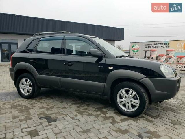 Чорний Хендай Туксон, об'ємом двигуна 2 л та пробігом 225 тис. км за 8000 $, фото 17 на Automoto.ua