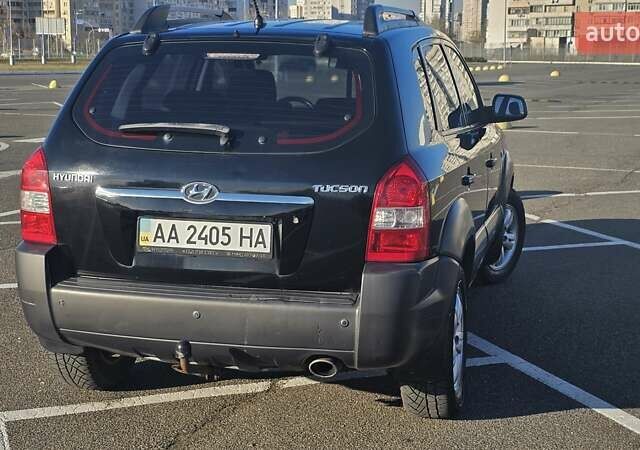 Чорний Хендай Туксон, об'ємом двигуна 1.98 л та пробігом 212 тис. км за 7766 $, фото 4 на Automoto.ua