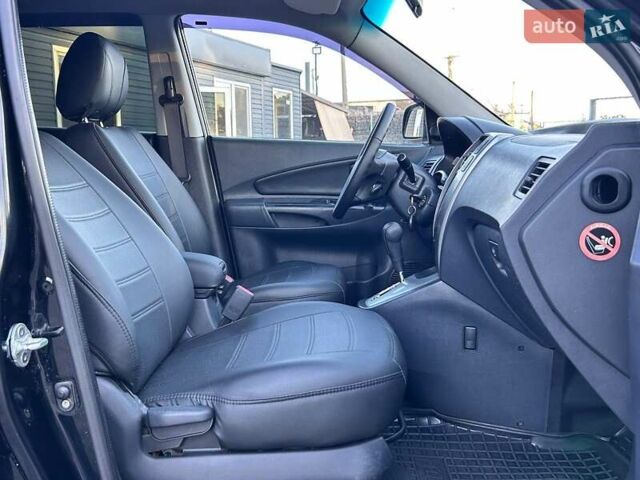 Черный Хендай Туксон, объемом двигателя 2 л и пробегом 230 тыс. км за 7500 $, фото 30 на Automoto.ua