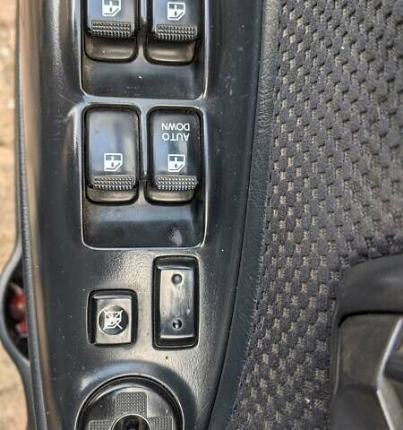 Черный Хендай Туксон, объемом двигателя 2 л и пробегом 163 тыс. км за 8100 $, фото 6 на Automoto.ua