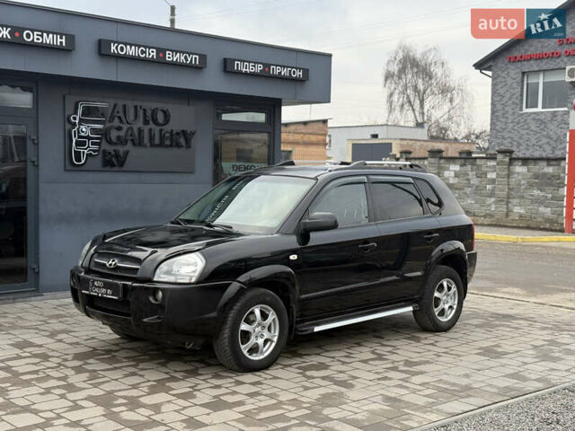 Чорний Хендай Туксон, об'ємом двигуна 2 л та пробігом 240 тис. км за 6888 $, фото 2 на Automoto.ua